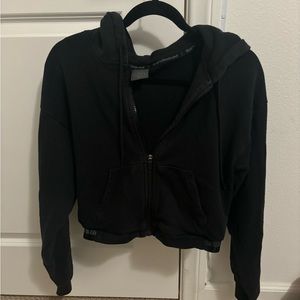 Black cropped sports illustrated zip up